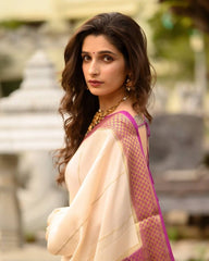 Ivory & Magenta Banarasi Silk Saree with Golden Zari Border