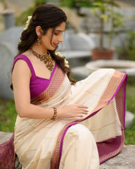 Ivory & Magenta Banarasi Silk Saree with Golden Zari Border